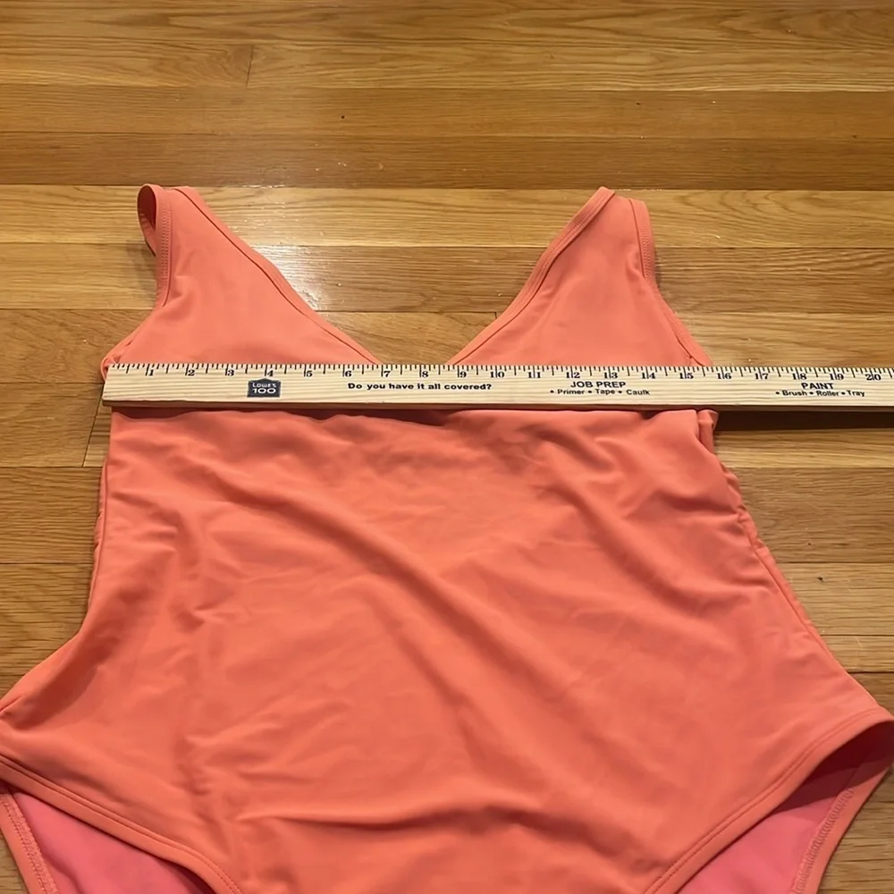 Kona sol women’s peach color vneck one piece swimsuit size xlarge.
